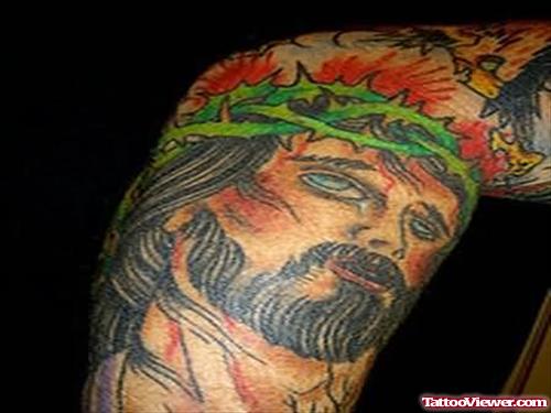Jesus Face Tattoo On Arm