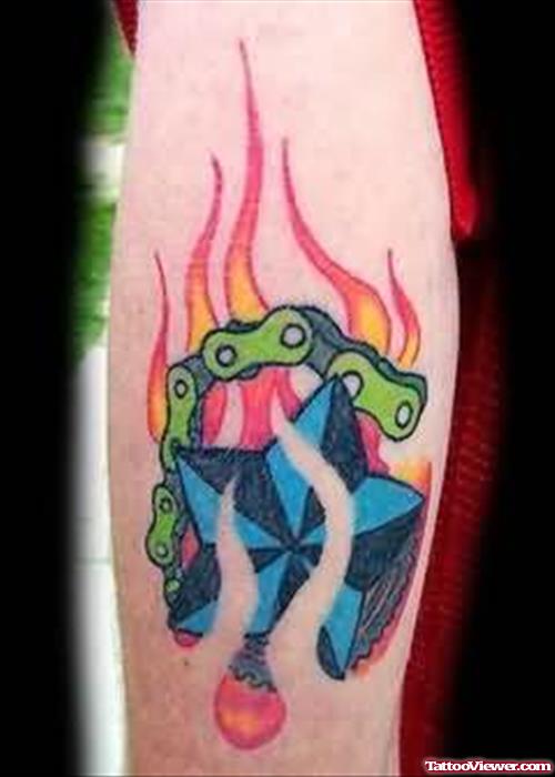 Burning Flames & Star Tattoo On Arm