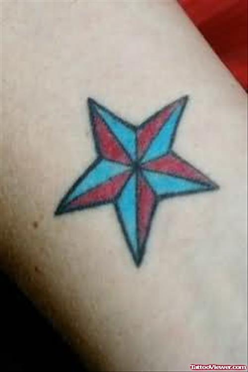 Coloured Star Tattoo On Arm