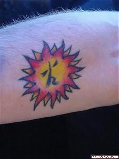 Sun Flame Tattoo On Arm