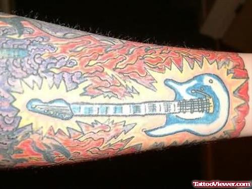 Guitar & Flames Tattoo On Arm