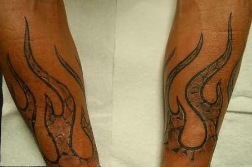 Fire And Flame Tattoos On Arm