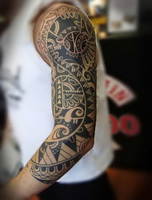 Black Ink Maori Left Arm Tattoo