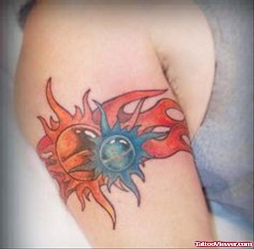 Flaming Sun and Moon Armband Tattoo On Bicep