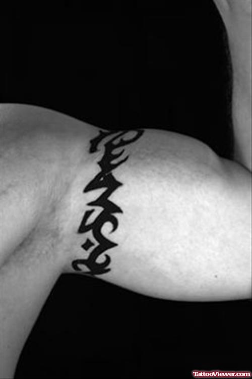 Black Ink Tribal Armband Tattoo On Man Bicep