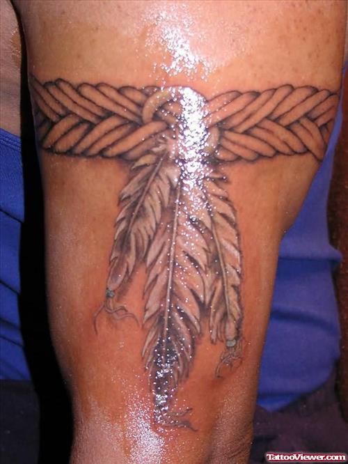 Awful Grey Ink Feather Armband Tattoo On Bicep
