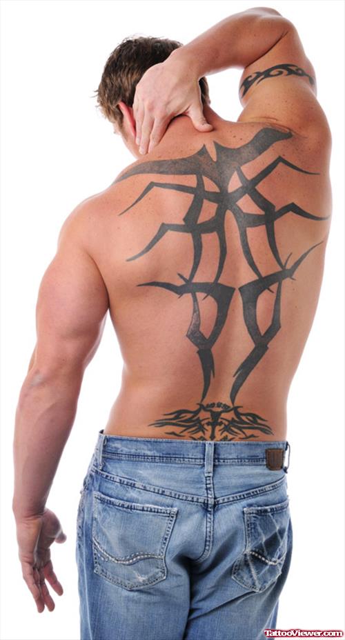 Tribal Tattoo On Back And Armband Tattoo