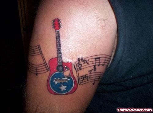 Music Notes And Guitar Armband Tattoo