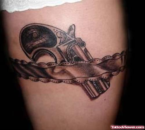 Grey Ink Small Gun Armband Tattoo