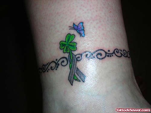 Celtic And Clover Leaf Armband Tattoo