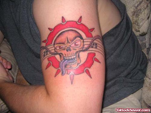 Sun And Skull Armband Tattoo On Left Bicep
