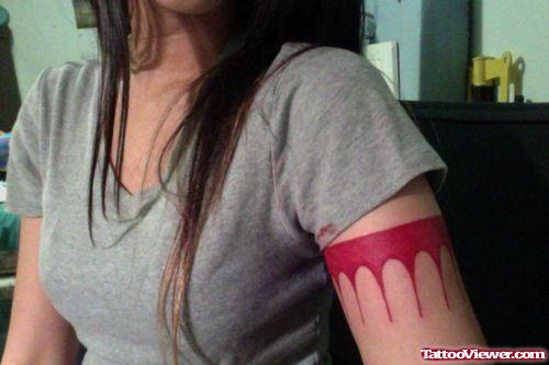 Melting Red Armband Tattoo On Girl Left Bicep
