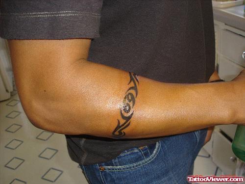 Black Ink Tribal Armband Tattoo On Forearm