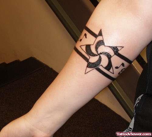 Glowing Star And Music Notes Armband Tattoo