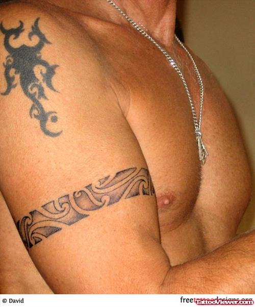 Cool Grey Ink Tribal Armband Tattoo On Bicep