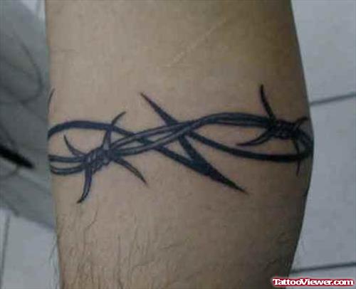 barbed-wire-tattoo-on-elbow.jpg