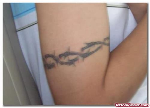 Barbed Wire Tattoo On Muscles