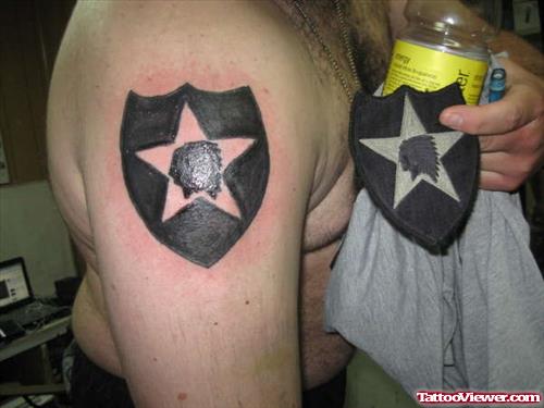 Army Logo Tattoo On Right Shoulder