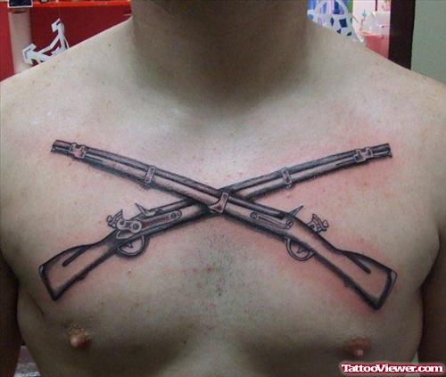Grey Ink Army Guns Tattoo On Man Chest