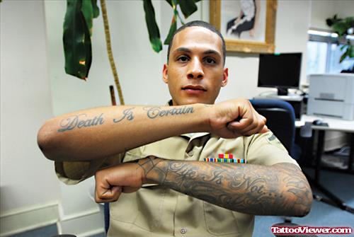 Grey Ink Army Tattoo On Man Left Sleeve