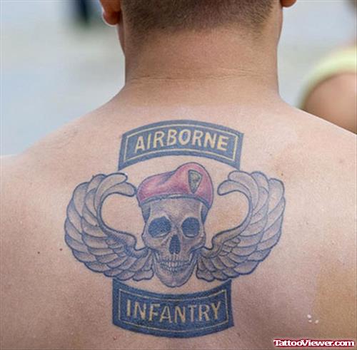 Winged Skull Army Tattoo On Upperback