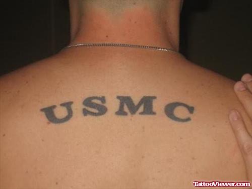 Simple USMC Word Tattoo On Back