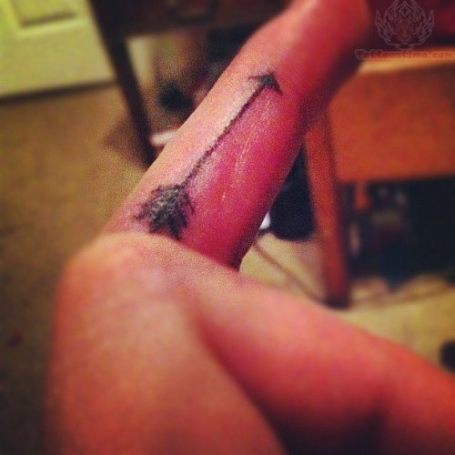 Black Ink Arrow Tattoo On Finger