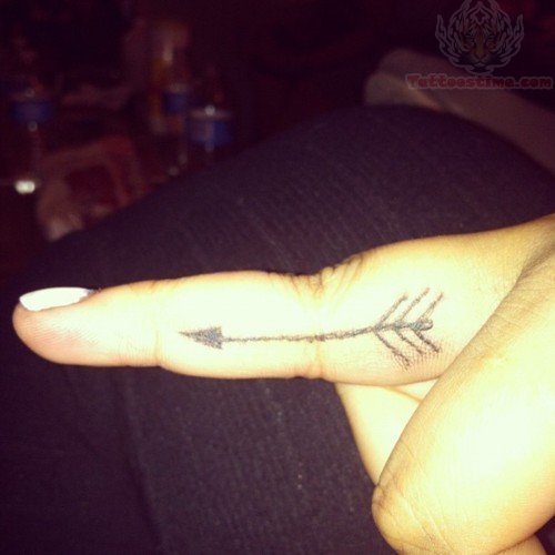 Arrow Black Ink Tattoo On Finger