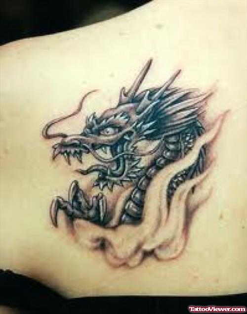 Grey Ink Asian Dragon Head Tattoo