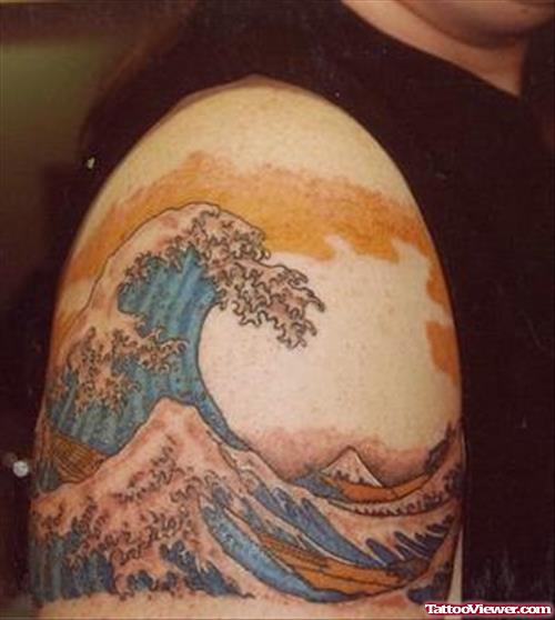 Blue Water Asian Tattoo On Right Shoulder