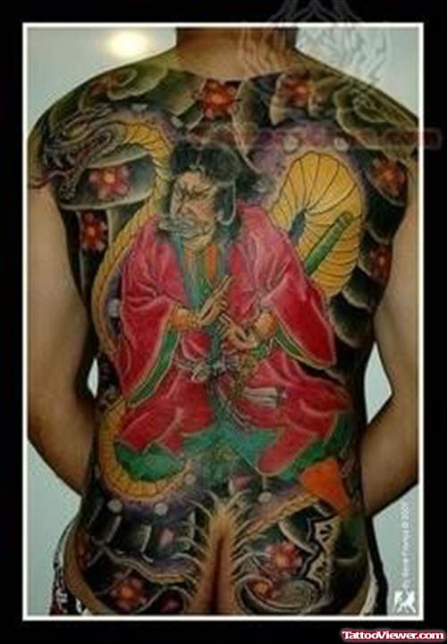 Colored Asian Tattoo On Man Back Body