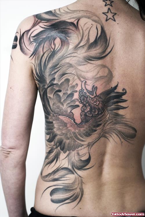 Grey Ink Asian Tattoo On Back Side