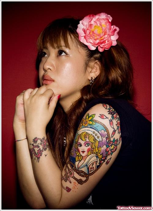 Color Ink Asian Tattoo On Girl Left Half Sleeve