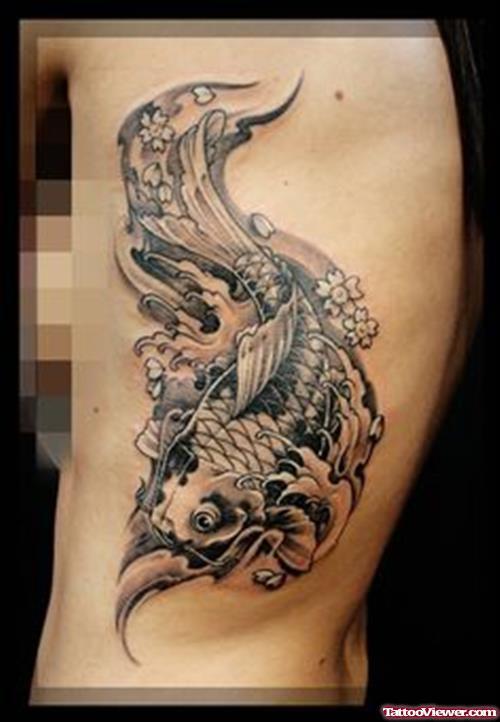 Grey Ink Asian Tattoo On Left Side Rib