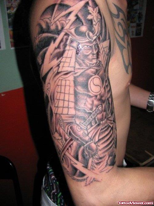 Amazing Grey Ink Asian Tattoo On Man Right Sleeve
