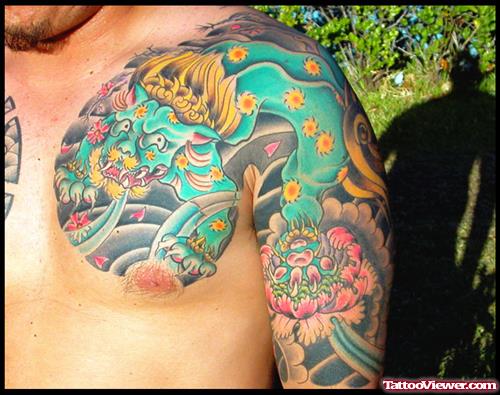 Colored Asian Tattoo On Chest And Left Sleeve