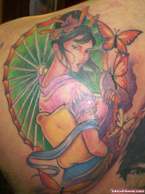 Colored Asian Girl Tattoo On Back Shoulder