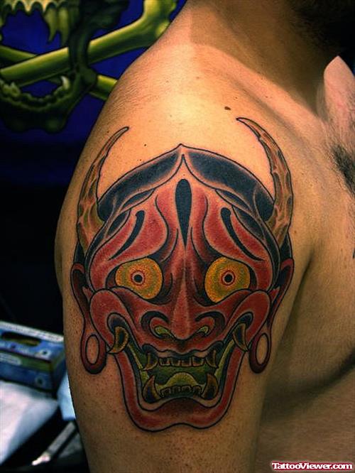 Color Ink Asian Tattoo On Right Shoulder
