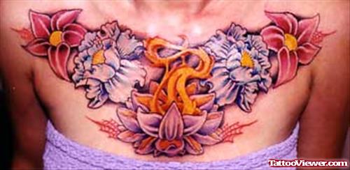 Lotus Flowers Asian Tattoo On Girl Chest