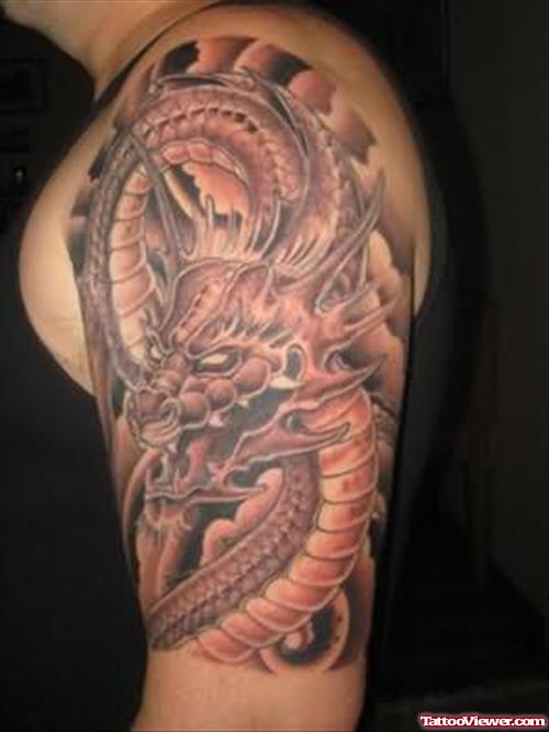 Grey Ink Dragon Asian Tattoo On Left Half Sleeve