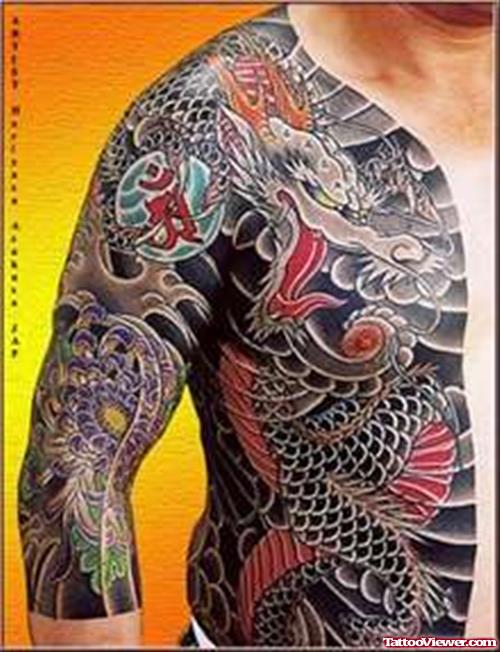 Colored Japanese Asian Tattoo On Sleeve And Side Rib