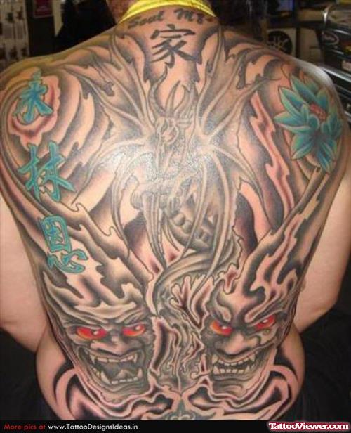Grey Ink Tribal Asian Tattoo On Back