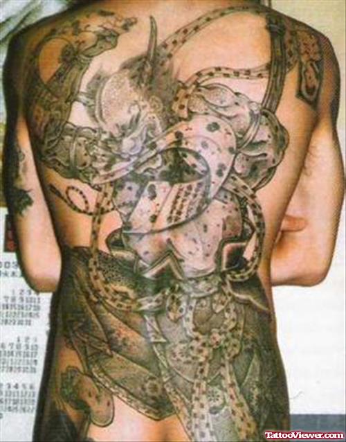 Cute Grey Ink Asian Tattoo On Back Body