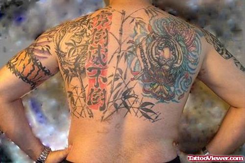 Asian Tattoos On Man Upperback