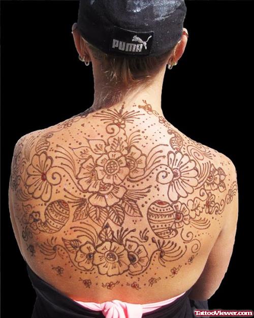 Asian Tattoo On Girl Upperback