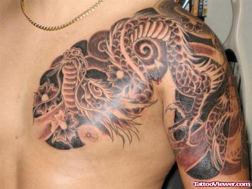 Grey Ink Dragon Asian Tattoo On Chest and Left Sleeve