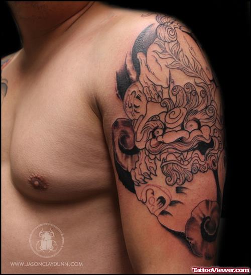 Grey Ink Asian Tattoo On Left Half Sleeve