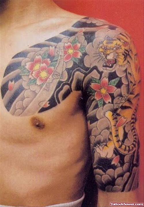 Asian Flowers Tattoos On Chest And Half Sleeve