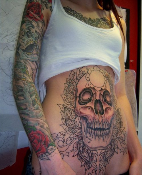 Grey Ink Skull Asian Tattoo On Belly