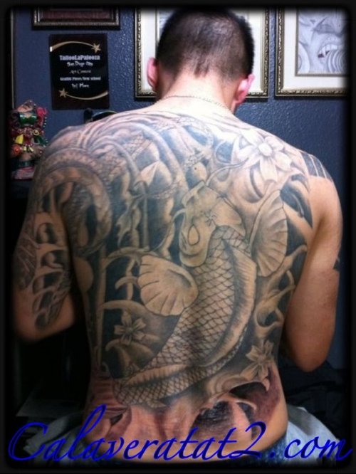 Grey Ink Asian Fish Tattoo On Back